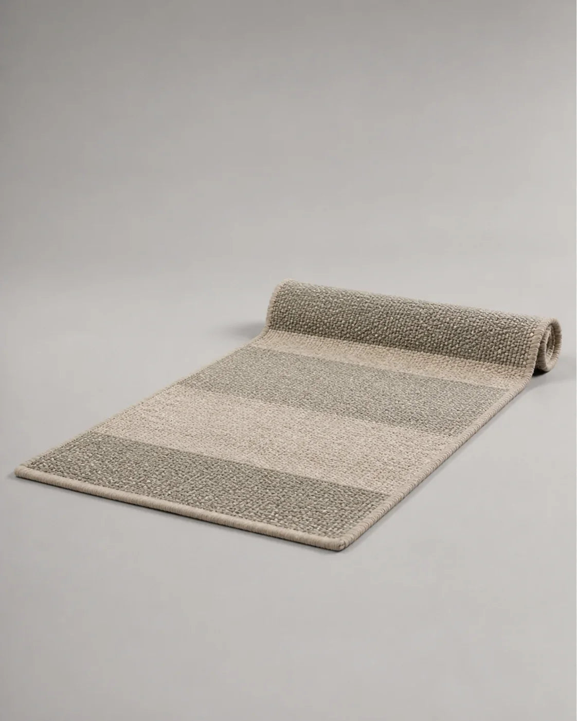Cairn Foldable Wool Travel Mat by ALPORA, a compact natural-wool ground layer for reading, resting and quiet moments away from home
